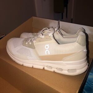 On Running White and Beige Sneakers